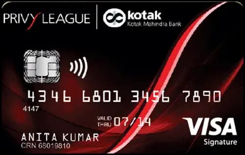 Kotak Privy League Signature credit card placed near airport lounge signage
