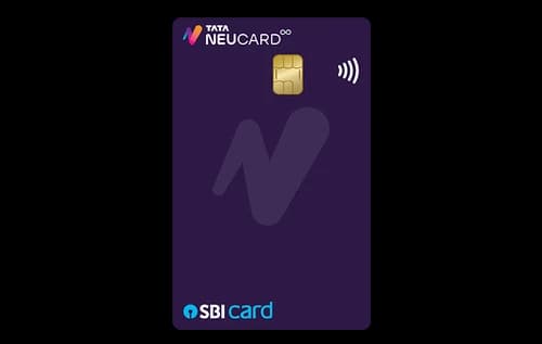 A premium metal credit card resting on a leather wallet